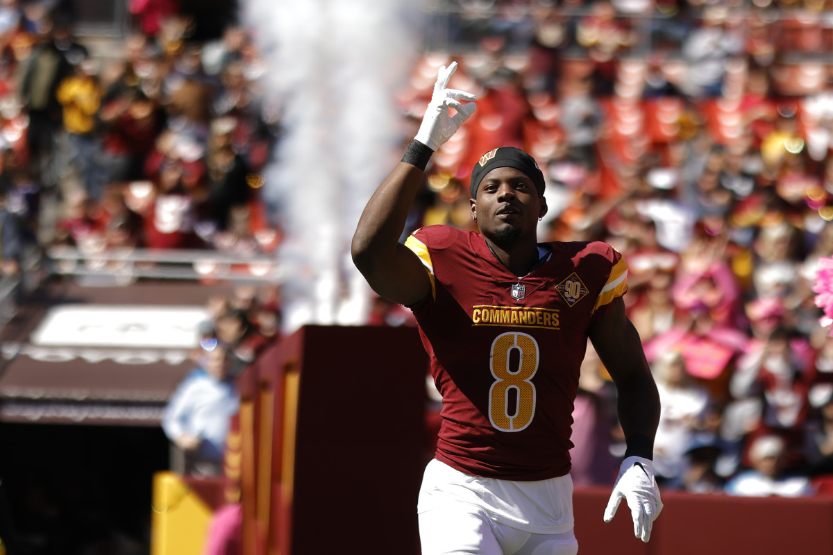 Oct 9, 2022; Landover, Maryland, USA; Washington Commanders running back Brian Robinson (8) is introduced prior to the start of the Commanders' game against the Tennessee Titans at FedExField. Mandatory Credit: Geoff Burke-USA TODAY Sports